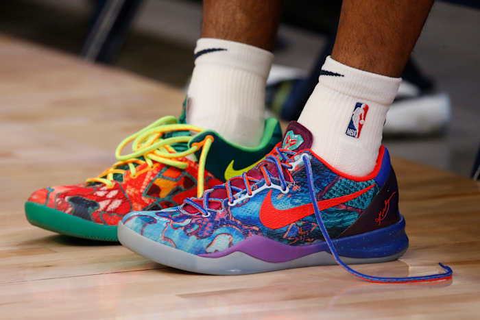 View of multi-colored Kobe 8 shoes.